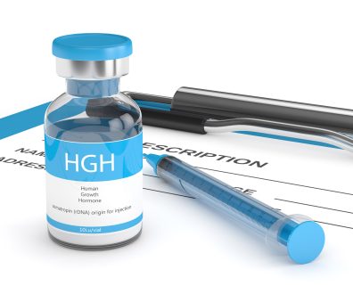 3d render of HGH vial with syringe on clipboard 3d render of HGH vial with syringe lying on prescription